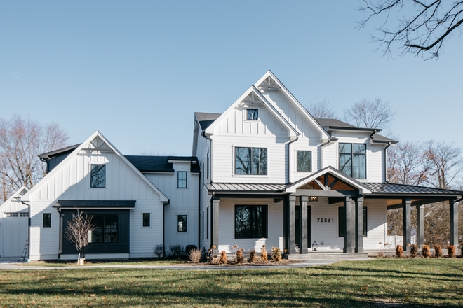 modern house with wrap around porch