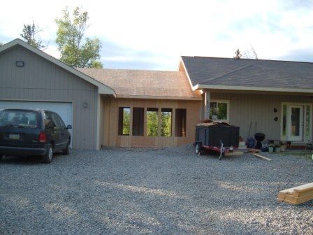 ranch house with breezeway to garage